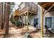 Multi-level patios and balconies with a view of the surrounding greenery creating an inviting outdoor space at 345 Anterbury Dr, Apex, NC 27502