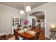 Comfortable dining room with a view of the adjacent kitchen, perfect for Gathering meals and gatherings at 345 Anterbury Dr, Apex, NC 27502