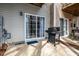 Outdoor patio featuring a sliding glass door, and a gas grill, great for barbecues at 345 Anterbury Dr, Apex, NC 27502