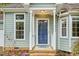 Close up exterior view of a home's front door at 4117 Olde Coach Rd, Durham, NC 27707