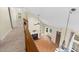 Open concept living room featuring carpet floors, a fireplace, and many windows at 4117 Olde Coach Rd, Durham, NC 27707