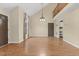 Bright living room with hardwood floors, high ceiling, chandelier, and balcony at 4117 Olde Coach Rd, Durham, NC 27707