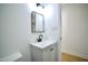 Contemporary bathroom with stylish vanity and mirror at 423 E Rockspring St, Henderson, NC 27536