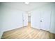 This bedroom boasts modern floors and offers ample space at 423 E Rockspring St, Henderson, NC 27536
