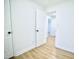 Bedroom with wood-look flooring and white trim at 423 E Rockspring St, Henderson, NC 27536