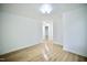 Clean, bright living room with modern lighting and wood-look flooring at 423 E Rockspring St, Henderson, NC 27536