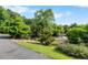 Tree-lined driveway and landscaping at 4811 New Sharon Church Rd, Hillsborough, NC 27278