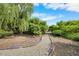 Stone-lined path through the lush property at 4811 New Sharon Church Rd, Hillsborough, NC 27278