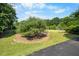 Lawn with a tree and fencing at 4811 New Sharon Church Rd, Hillsborough, NC 27278