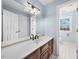 Bright bathroom features white countertops, tile floor, and a window for natural light at 4811 New Sharon Church Rd, Hillsborough, NC 27278