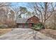 Attractive brick home with a two-car garage and a paved driveway at 4811 New Sharon Church Rd, Hillsborough, NC 27278