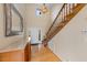 Bright foyer with hardwood floors, staircase, and natural light at 4811 New Sharon Church Rd, Hillsborough, NC 27278