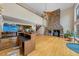 Open floor plan with hardwood floors, stone fireplace, and lots of natural light at 4811 New Sharon Church Rd, Hillsborough, NC 27278