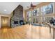 Bright living room with hardwood floors, soaring ceilings, and a stone fireplace at 4811 New Sharon Church Rd, Hillsborough, NC 27278