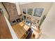 Spacious living room boasting a soaring stone fireplace and large windows for natural light at 4811 New Sharon Church Rd, Hillsborough, NC 27278