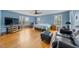 Spacious main bedroom with hard floors, cozy seating and plenty of windows at 4811 New Sharon Church Rd, Hillsborough, NC 27278