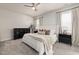 Bright bedroom featuring a ceiling fan, plush carpet, and natural light at 508 Sweet Pine Ln, Knightdale, NC 27545