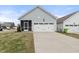 Charming single-Gathering home with a two-car garage, screened in porch and well-maintained lawn at 508 Sweet Pine Ln, Knightdale, NC 27545