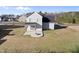 Expansive backyard with patio and stone fire pit, perfect for outdoor entertaining at 54 Silverleaf Dr, Wendell, NC 27591