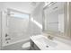 Clean bathroom features a shower/tub combo, a white sink, white toilet, and white fixtures at 54 Silverleaf Dr, Wendell, NC 27591