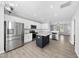 Open concept kitchen with stainless steel appliances and granite island, great for entertaining and cooking at 54 Silverleaf Dr, Wendell, NC 27591