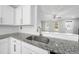 Bright kitchen with granite countertops, stainless steel faucet and subway tile backsplash at 54 Silverleaf Dr, Wendell, NC 27591