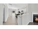Modern kitchen with a large island, granite countertops, stainless steel appliances, and ample cabinet space at 54 Silverleaf Dr, Wendell, NC 27591