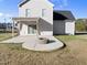 Covered patio with a ceiling fan and a view of the backyard fire pit at 54 Silverleaf Dr, Wendell, NC 27591