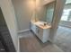 This bathroom has a double sink vanity with tile flooring at 5640 Cayden Cove Dr, Wendell, NC 27591