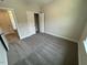 This bedroom has neutral walls, carpet, and a closet at 5640 Cayden Cove Dr, Wendell, NC 27591