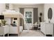Bright bedroom featuring a bunk bed, table with chairs, chest of drawers, and plant decor at 5645 Cayden Cove Dr, Wendell, NC 27591