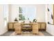 Stylish home office featuring a modern desk, ample storage, and natural light at 5645 Cayden Cove Dr, Wendell, NC 27591
