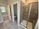 Modern bathroom featuring a tiled shower with glass door and toilet inside the water closet at 5648 Cayden Cove Dr, Wendell, NC 27591