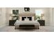 Serene bedroom features a neutral palette, complemented by dark wood accents and modern furnishings, creating a tranquil retreat at 5648 Cayden Cove Dr, Wendell, NC 27591