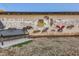 A whimsical wall mural featuring bees and flowers, adding a touch of nature-inspired art to the urban landscape at 5648 Cayden Cove Dr, Wendell, NC 27591