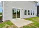 Back of house showing sliding glass door and series of horizontal windows at 571 White Birch Ln, Angier, NC 27501