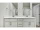 Bright bathroom features double vanity with modern fixtures and hardware at 591 White Birch Ln, Angier, NC 27501
