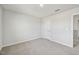 Empty bedroom with plush carpet and a simple design at 591 White Birch Ln, Angier, NC 27501