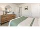 Comfortable bedroom featuring stylish decor and a view into an adjoining space at 591 White Birch Ln, Angier, NC 27501