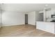 Bright and airy living room with hardwood floors and neutral paint at 591 White Birch Ln, Angier, NC 27501