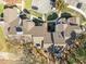 A captivating aerial view of the property showcases the beautiful roof lines and surrounding landscaping at 6001 Winterpointe Ln # 204, Raleigh, NC 27606
