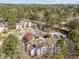 Aerial view of the apartments nestled in a serene, wooded setting offers a tranquil living environment at 6001 Winterpointe Ln # 204, Raleigh, NC 27606