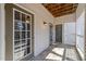 Inviting outdoor patio with wood flooring and a view of surrounding buildings at 6001 Winterpointe Ln # 204, Raleigh, NC 27606