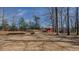 Spacious backyard with storage shed and mature trees; ready for your dreams at 6089 Joe Trail Ct, Mebane, NC 27302