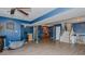 Finished basement area with stairs, kitchenette, and stylish decor with wood look floors at 6089 Joe Trail Ct, Mebane, NC 27302