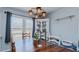 A view of the dining room that features wooden chairs and cabinet at 6089 Joe Trail Ct, Mebane, NC 27302