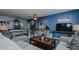 Inviting living room with stylish decor and an open staircase at 6089 Joe Trail Ct, Mebane, NC 27302