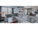 Spacious living area with a comfortable sectional sofa, dining, and great natural light at 6089 Joe Trail Ct, Mebane, NC 27302