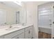 Bathroom with a double vanity, large mirror and a view into the shower at 65 Hickory Run Ln, Franklinton, NC 27525