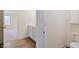 Bathroom with vanity featuring white cabinetry and a separate toilet room at 65 Hickory Run Ln, Franklinton, NC 27525